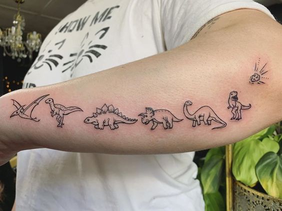 Hand Dinosaur Tattoo