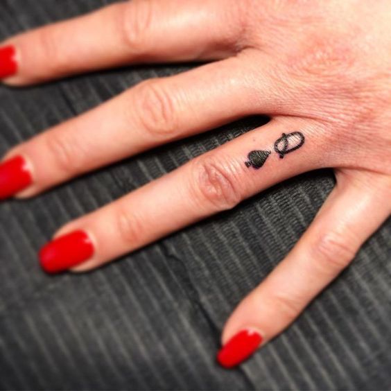 Q-Spade Nail Tattoo design