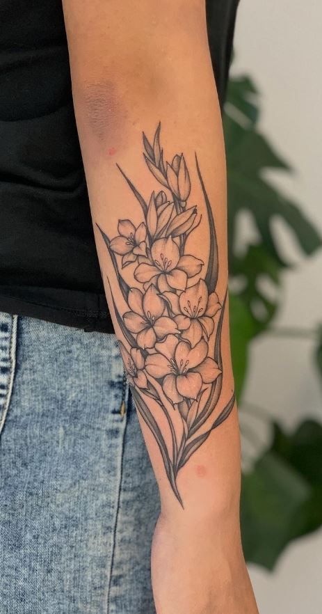 Elegant Hand gladiolus tattoo