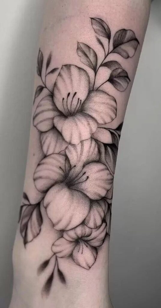 Simple gladiolus hand tattoo