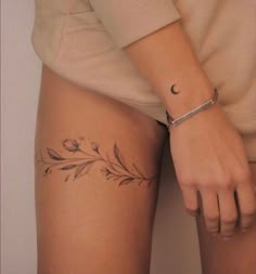 Thigh tattoo