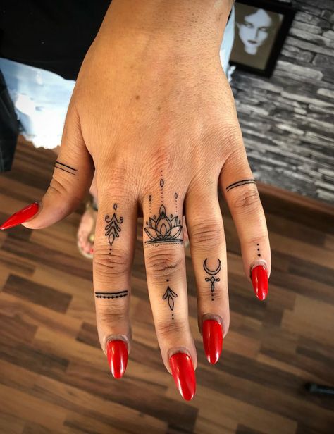 Women's finger tattoo