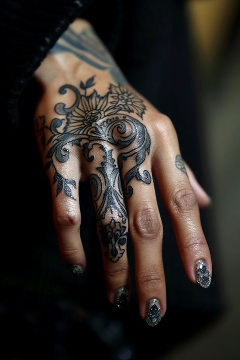 Women's finger tattoo