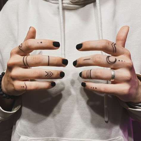 Women's finger tattoo