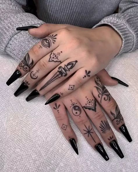 Women's finger tattoo