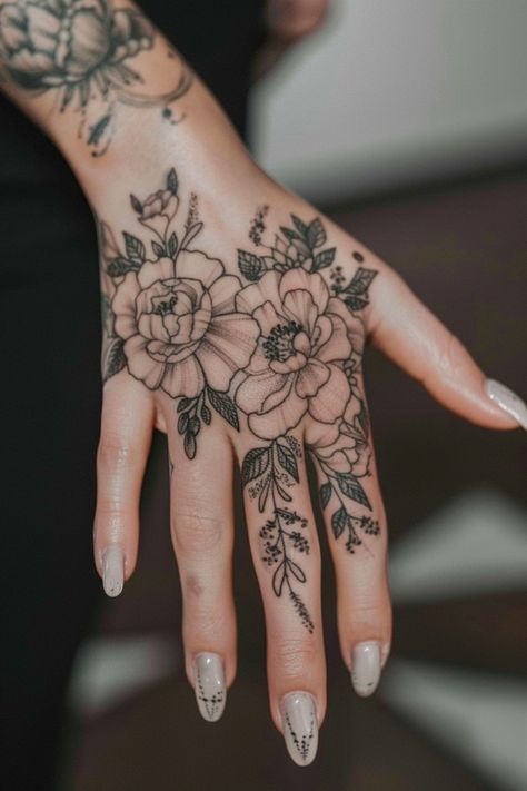 Women's finger tattoo