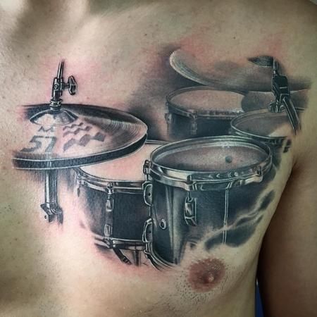 Beautiful Drummer Tattoo design on chest