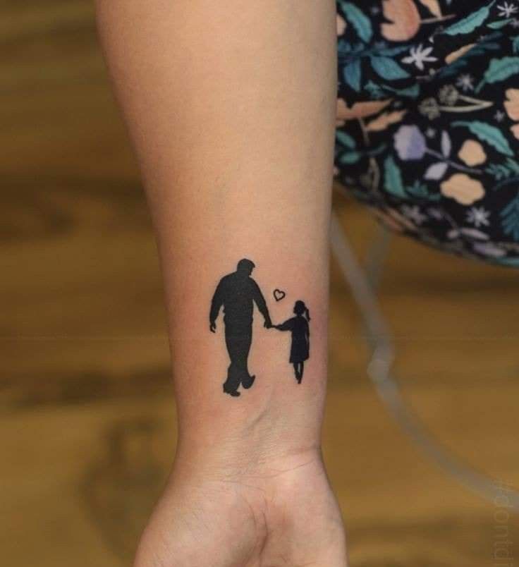 Father daughter silhouette tattoo