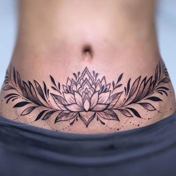 Gorgeous stomach tattoo for women