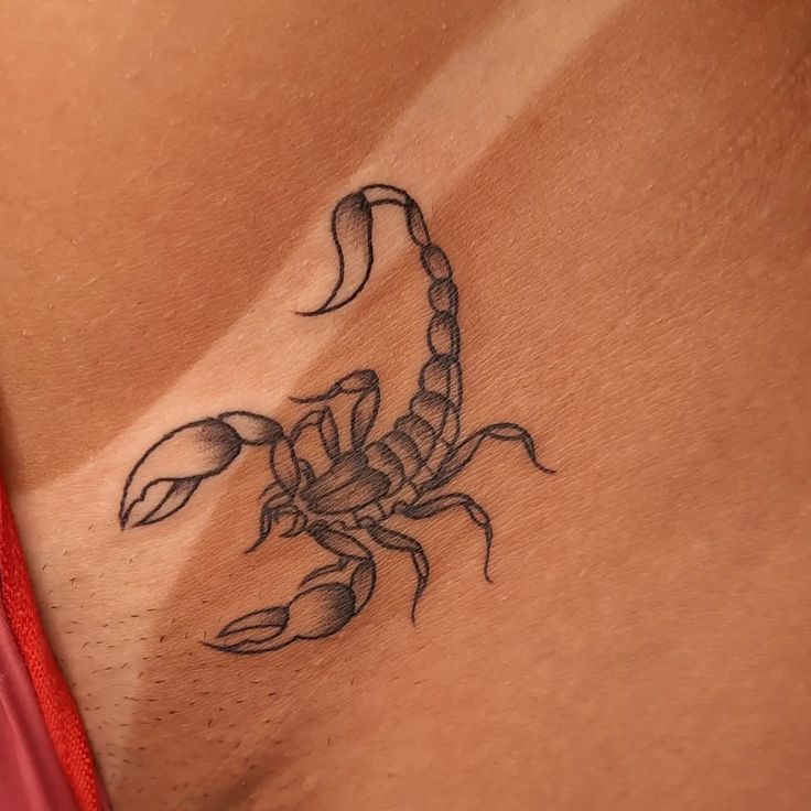 Minimalistic Scorpion Tattoo