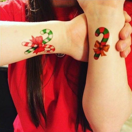 Simple colord Christmas stick tattoo